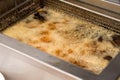 Hot oil deep frying potato