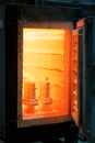 Hot orange oven for roasting. Steel production. Professional constructions. A furnace for melting. Metal industry.