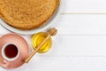 Hot pancakes with honey on a plate, Breakfast tea with crepes Royalty Free Stock Photo