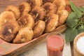 Hot patty on a table with tomato juice Royalty Free Stock Photo