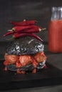 Hot peppers hamburger with black bread and meatballs