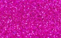 Hot pink abstract background. Pink glitter closeup photo. Pink shimmer wrapping paper. Royalty Free Stock Photo