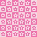 Cute pink and white flowers on checkered squares seamless pattern. Royalty Free Stock Photo