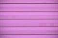 Hot pink striped fence. Facing surface, wooden texture. Coating background. Abstract pattern of wood planking. Decorative purple f Royalty Free Stock Photo