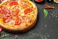 Hot pizza, Chopped pizza with four types of toppings, Food recipe background. Close up