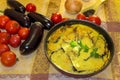 Hot ready moussaka in the form for baking among vegetables and s