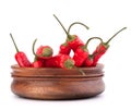 Hot red chili or chilli pepper in wooden bowl Royalty Free Stock Photo