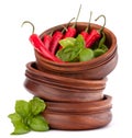 Hot red chili or chilli pepper in wooden bowls stack Royalty Free Stock Photo