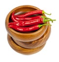 Hot red chili or chilli pepper in wooden bowls stack Royalty Free Stock Photo