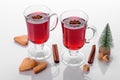 Hot red mulled wine isolated on white background with christmas spices Royalty Free Stock Photo