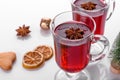 Hot red mulled wine isolated on white background with christmas spices Royalty Free Stock Photo