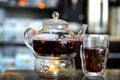 Fragrant flower tea in a glass teapot