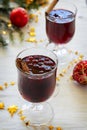 Hot red wine with cranberries and orange
