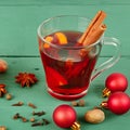 Hot red wine drink with sugar and spices. Traditional Christmas drink