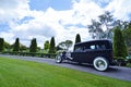 Hot rod bridal car arrives garden wedding ceremony