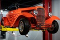 Detail of orange hot rod in the workshop elevator 1932 Ford Model 18 Roadster "Orange Twist"