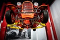 Detail of orange hot rod in the workshop elevator 1932 Ford Model 18 Roadster "Orange Twist"