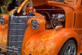 Hot rods are old classic American cars with large engines modified for linear speed.