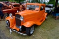 Hot rods are old classic American cars with large engines modified for linear speed.