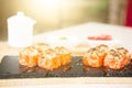 Hot Roll with Cream Cheese. Deep Fried Salmon outside. Salmon Fried Maki Sushi Royalty Free Stock Photo