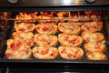 Hot sandwiches cooking in kitchen-range. Sandwiches cooking in oven