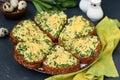 Hot sandwiches with wild garlic, green onions, eggs, cheese and parsley