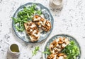 Hot sandwiches with mushrooms and mozzarella on a light background, top view. Delicious appetizer Royalty Free Stock Photo