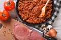 Hot sauce bolognese and fresh ingredients horizontal top view Royalty Free Stock Photo