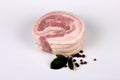 Hot smoked bacon roulette. Smoked pork roll. Roll of lard and meat Royalty Free Stock Photo
