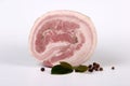 Hot smoked bacon roulette. Smoked pork roll. Roll of lard and meat Royalty Free Stock Photo