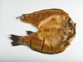 Hot smoked carp on a white background