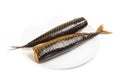 Hot smoked mackerel on plate Royalty Free Stock Photo