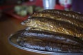 Hot smoked Omul (endemic species of fish in the lake Baikal, Russia).