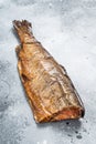 Hot smoked rainbow river trout headless. Gray background. Top view
