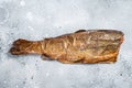 Hot smoked rainbow river trout headless. Gray background. Top view