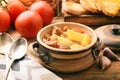 Hot soup goulash on brown wooden table. Royalty Free Stock Photo