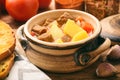 Hot soup goulash on brown wooden table. Royalty Free Stock Photo