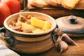 Hot soup goulash on brown wooden table. Royalty Free Stock Photo