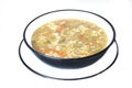 Chicken and vegetables soup in a bowl and a plate Royalty Free Stock Photo