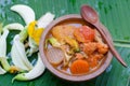 Hot and sour curry with tamarind sauce, fish and vegetables Royalty Free Stock Photo
