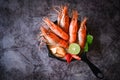 Hot and sour spicy shrimps prawns soup curry lemon lime galangal red chili straw mushroom on table food, Shrimp soup on seafood Royalty Free Stock Photo