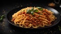 Hot spaghetti pasta with tomato sauce, parmesan and basil leaves in black plate on dark background Royalty Free Stock Photo