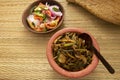 Hot and Spicy Brinjal moju with spicy Ingredients on clay pot