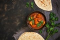 Hot spicy chicken tikka masala in bowl.A popular Indian spicy dish. Top view, close-up. Royalty Free Stock Photo