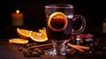 Hot spicy Christmas gluhwein, or mulled red wine with sugar and spices, served with cookies on rustic wood with a Royalty Free Stock Photo