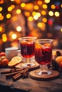 Hot spicy Christmas gluhwein, or mulled red wine with sugar and spices, served with cookies on rustic wood with a Royalty Free Stock Photo