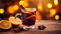 Hot spicy Christmas gluhwein, or mulled red wine with sugar and spices, served with cookies on rustic wood with a Royalty Free Stock Photo