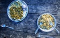 Hot and spicy cooked noodles and red kidney beans and rice served in steel plate and forks on wooden table Royalty Free Stock Photo