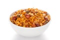 Hot spicy Nav Ratan snacks in a white ceramic bowl  made with red chili  peanuts Royalty Free Stock Photo