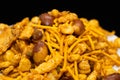 Hot spicy NavRatan mixture snacks in full-frame, made with, potato chips, peanuts, besan sev spicy snacks (Namkeen) Royalty Free Stock Photo